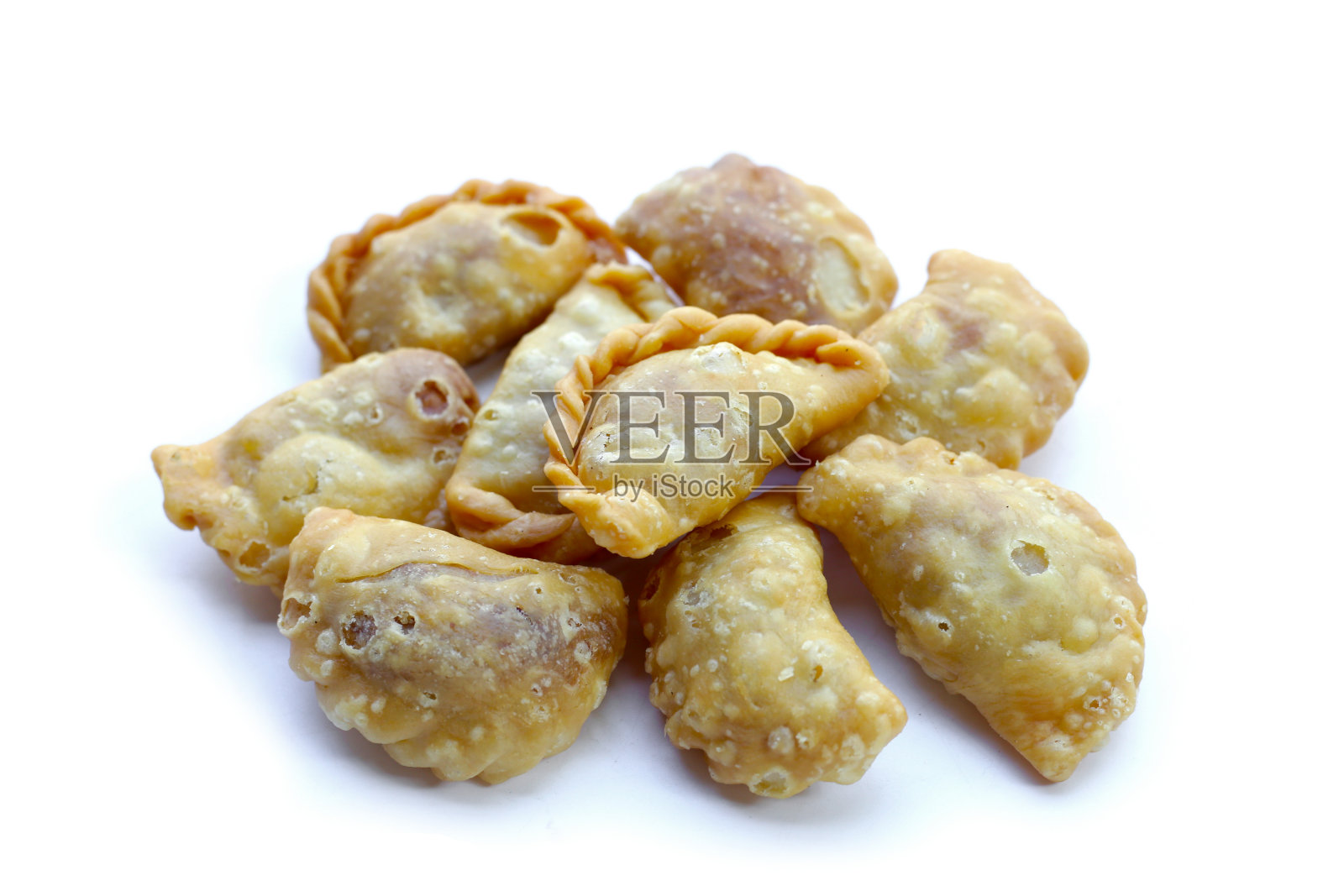 迷你咖喱泡芙。泰国甜品照片摄影图片