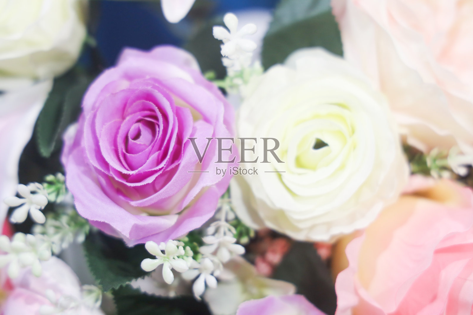 婚礼上新娘捧花中的玫瑰照片摄影图片