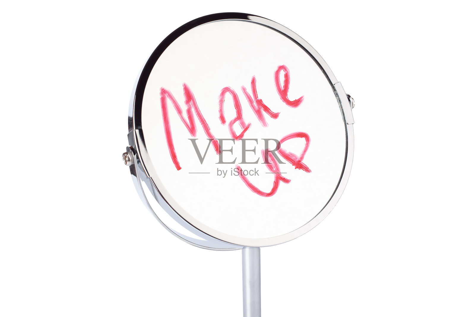 化妆在镜子上是用红色口红写的。题词化妆面镜。桌面化妆镜隔离。家中金属镜面封闭隔离照片摄影图片