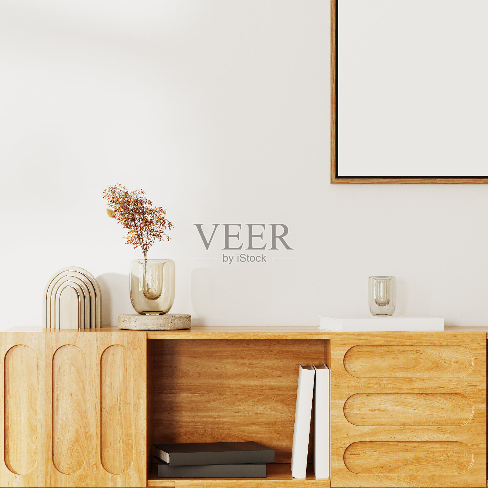 木柜与书籍和装饰的特写，白色墙壁上的空框架的角落，内部细节，3d渲染照片摄影图片