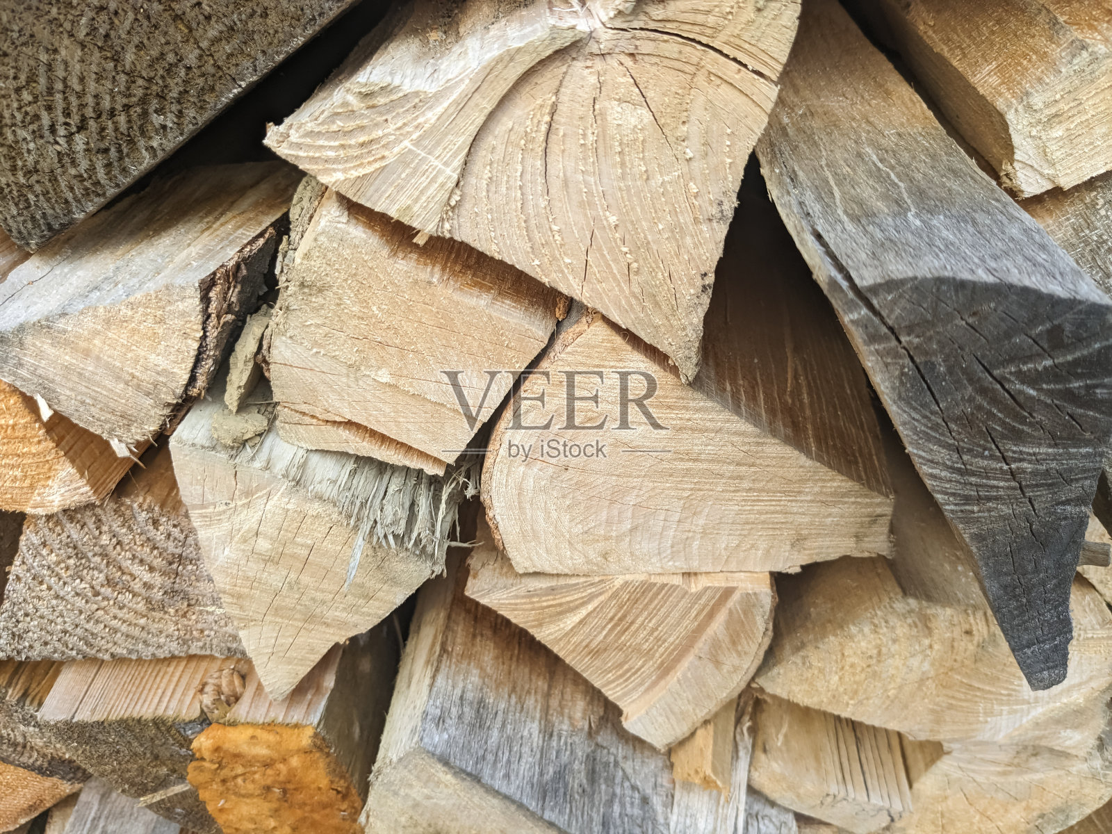 一堆木柴特写。照片摄影图片