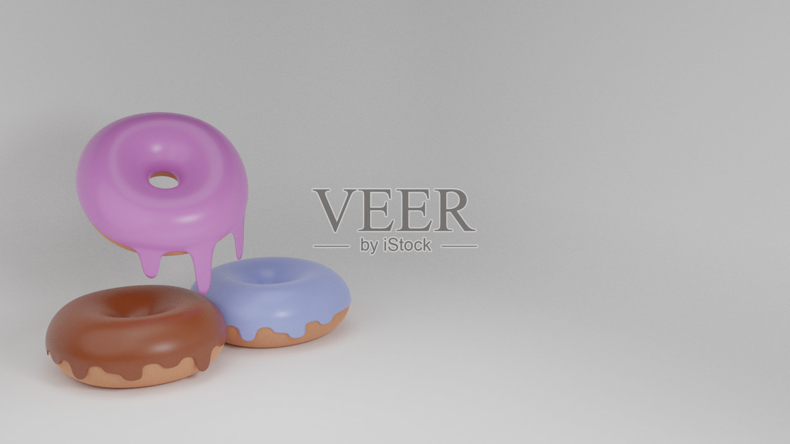 三个甜甜圈左白色背景照片摄影图片