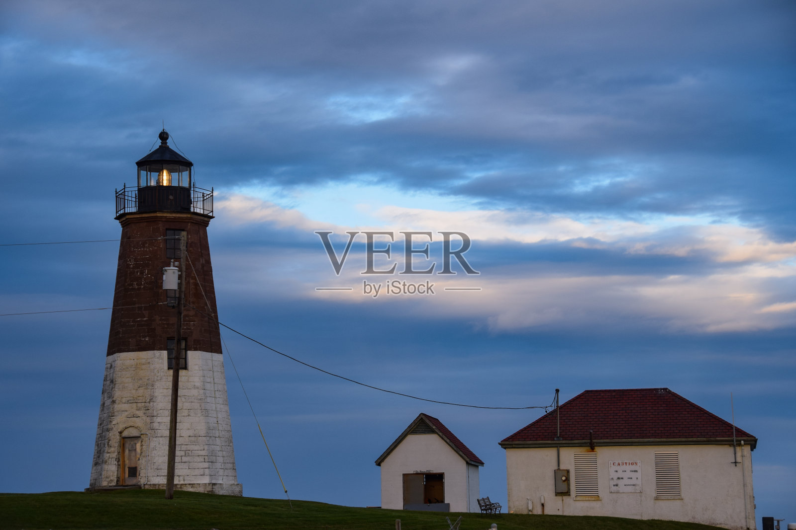 朱迪思角灯塔与穆迪天空照片摄影图片