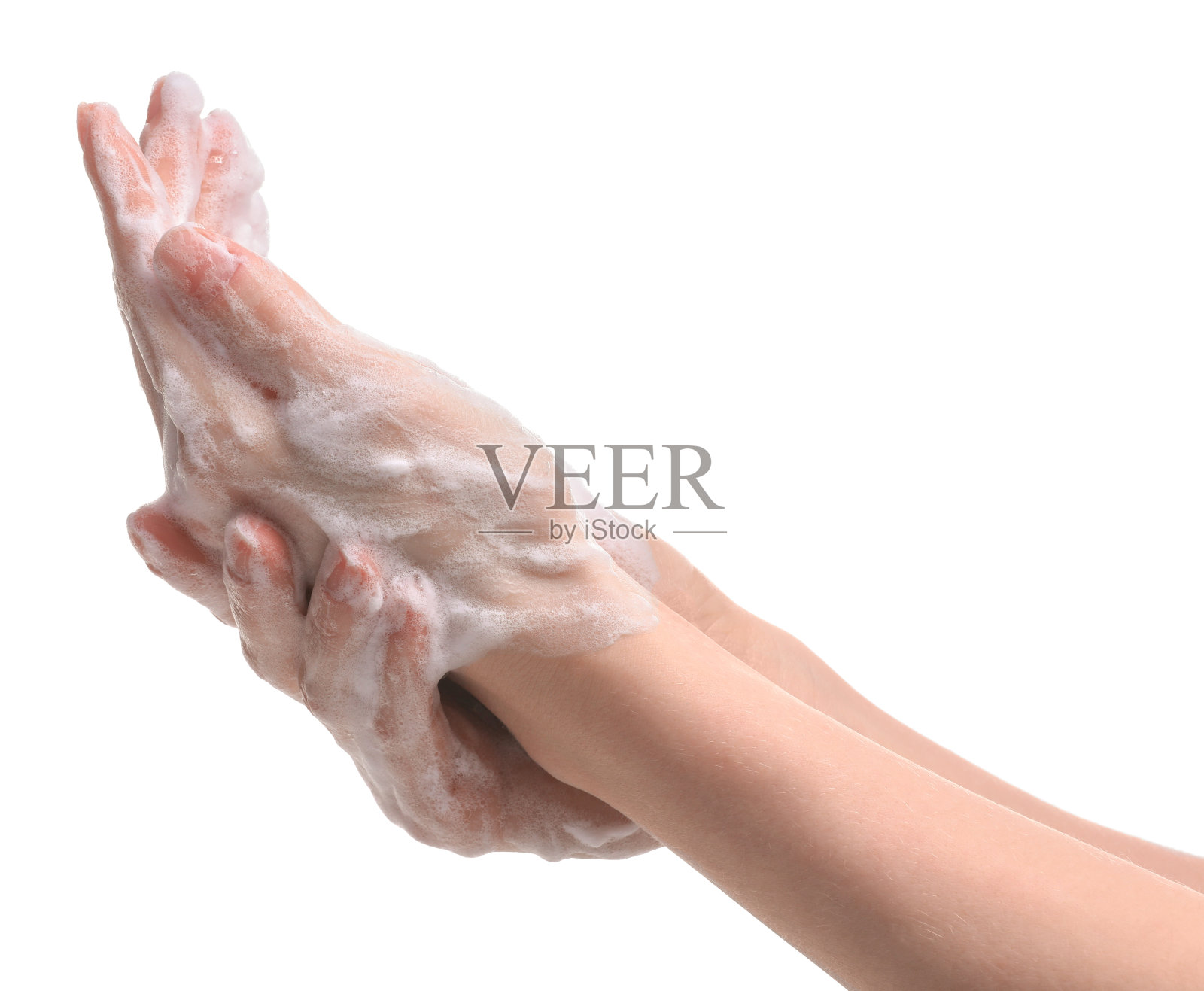 在白色背景上用清洁泡沫洗手的妇女，特写照片摄影图片