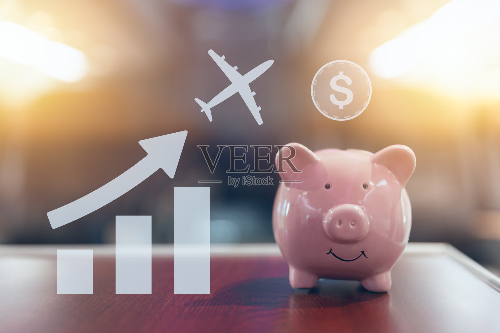 快乐储蓄罐上的模糊客舱为节省机票低成本好值省钱的商务旅行旅行理念照片摄影图片