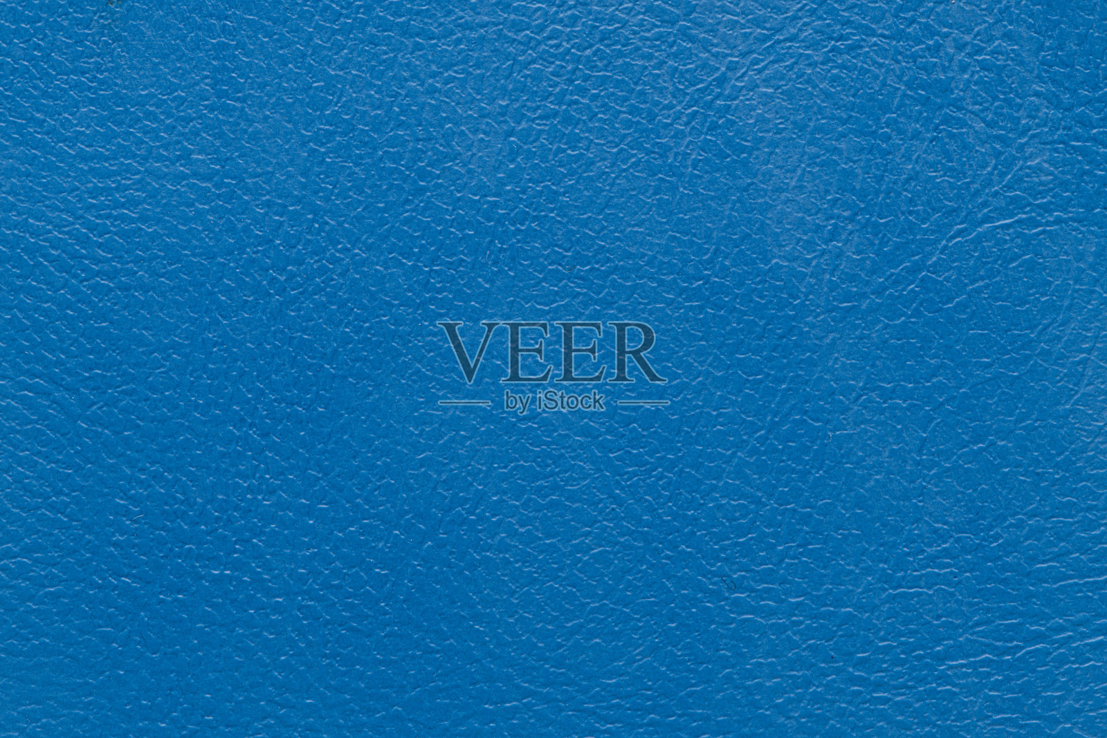 特写细节上的蓝色皮革纹理背景照片摄影图片