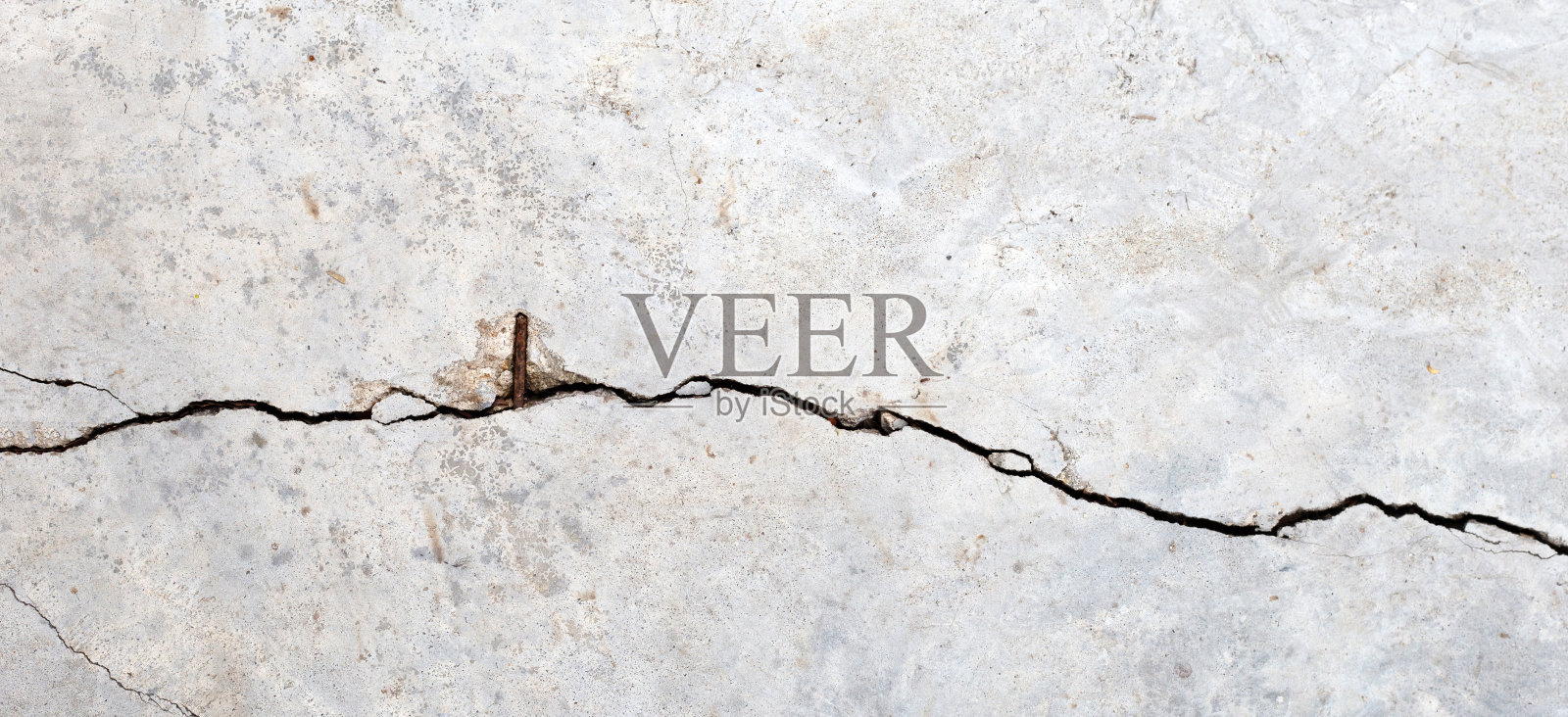 裂缝混凝土地板纹理背景。照片摄影图片