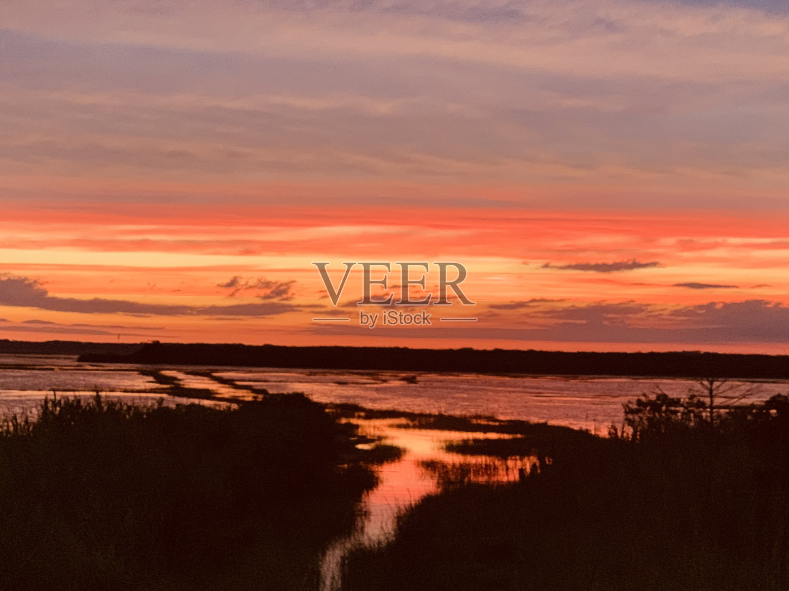 海湾上的日落照片摄影图片