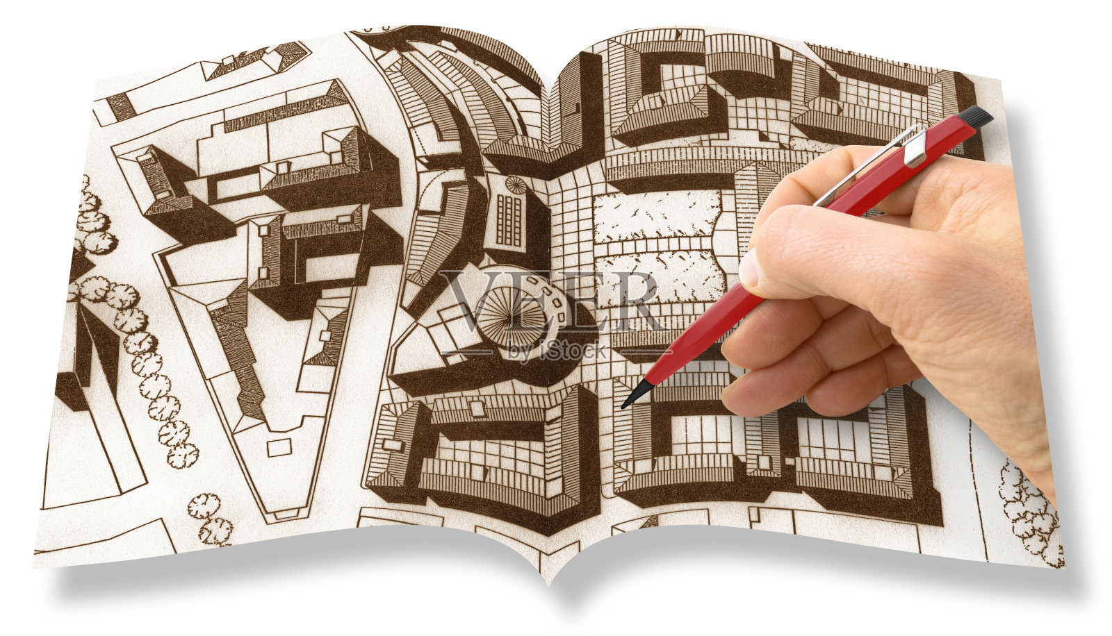 规划一个新的城市-工程师-建筑师用铅笔绘制一个新的现代想象城镇的草图-真正的打开书的概念照片摄影图片