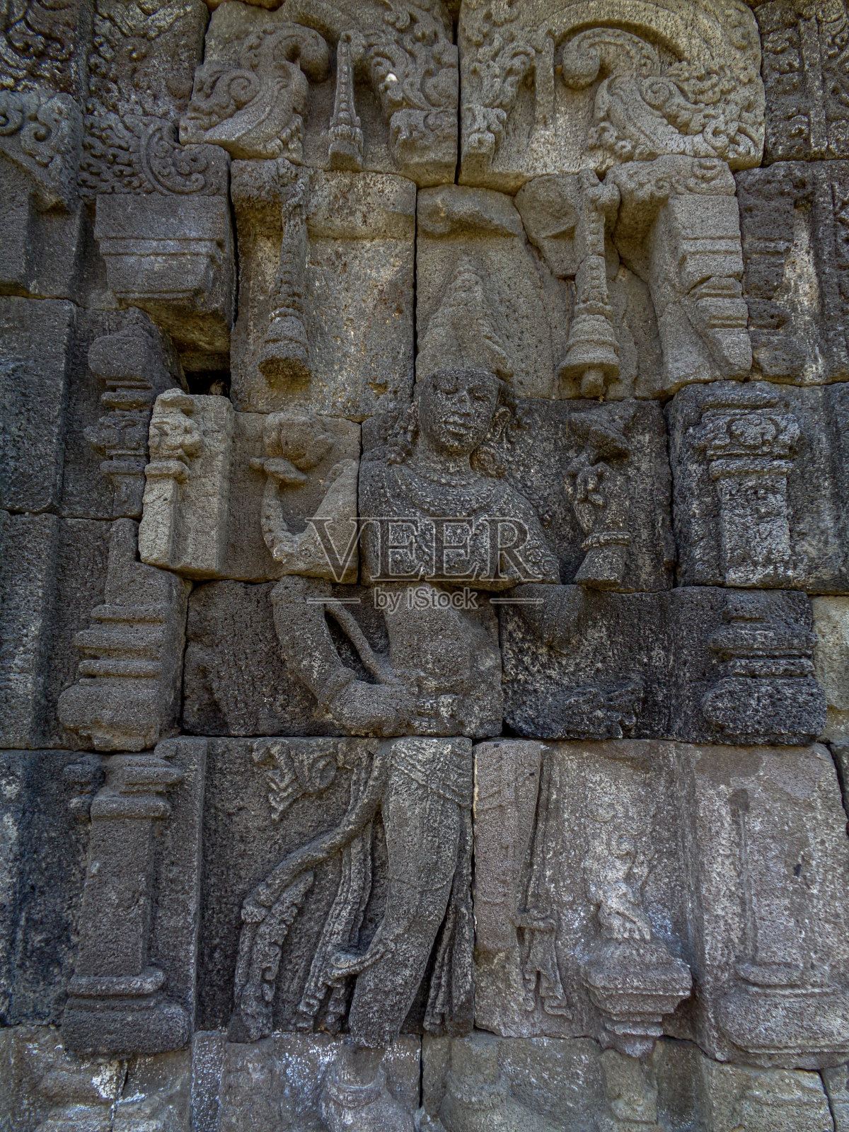 老三寺墙上雕刻的印度教女神照片摄影图片