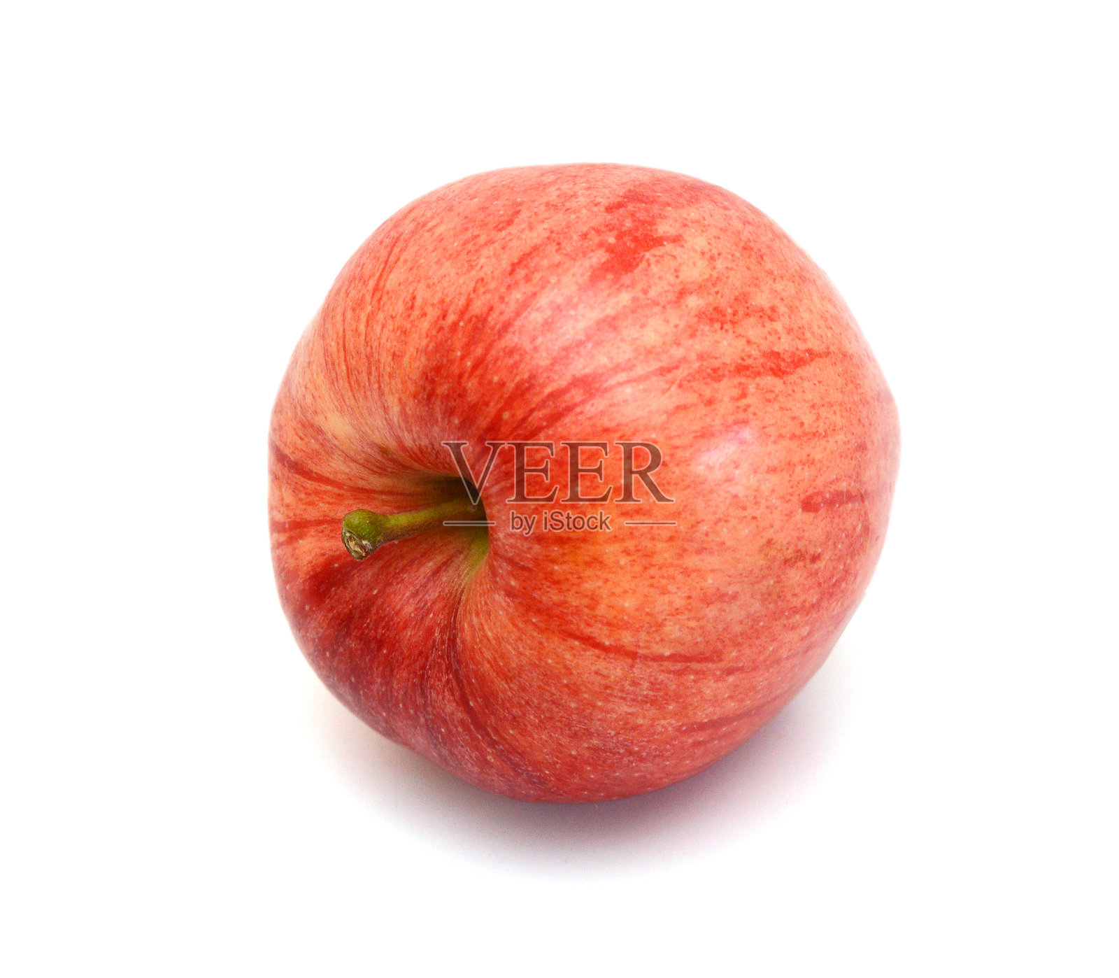 白色背景上有叶子和切片的红苹果。照片摄影图片