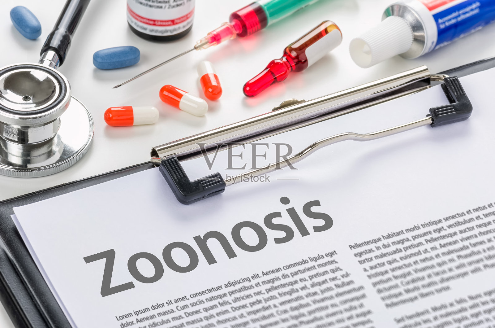 写在剪贴板上的人畜共患病照片摄影图片