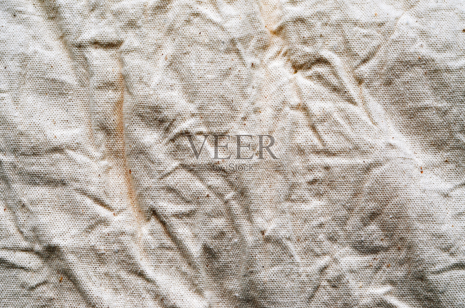 皱巴巴的白色织物纹理。抽象的背景和纹理设计。照片摄影图片