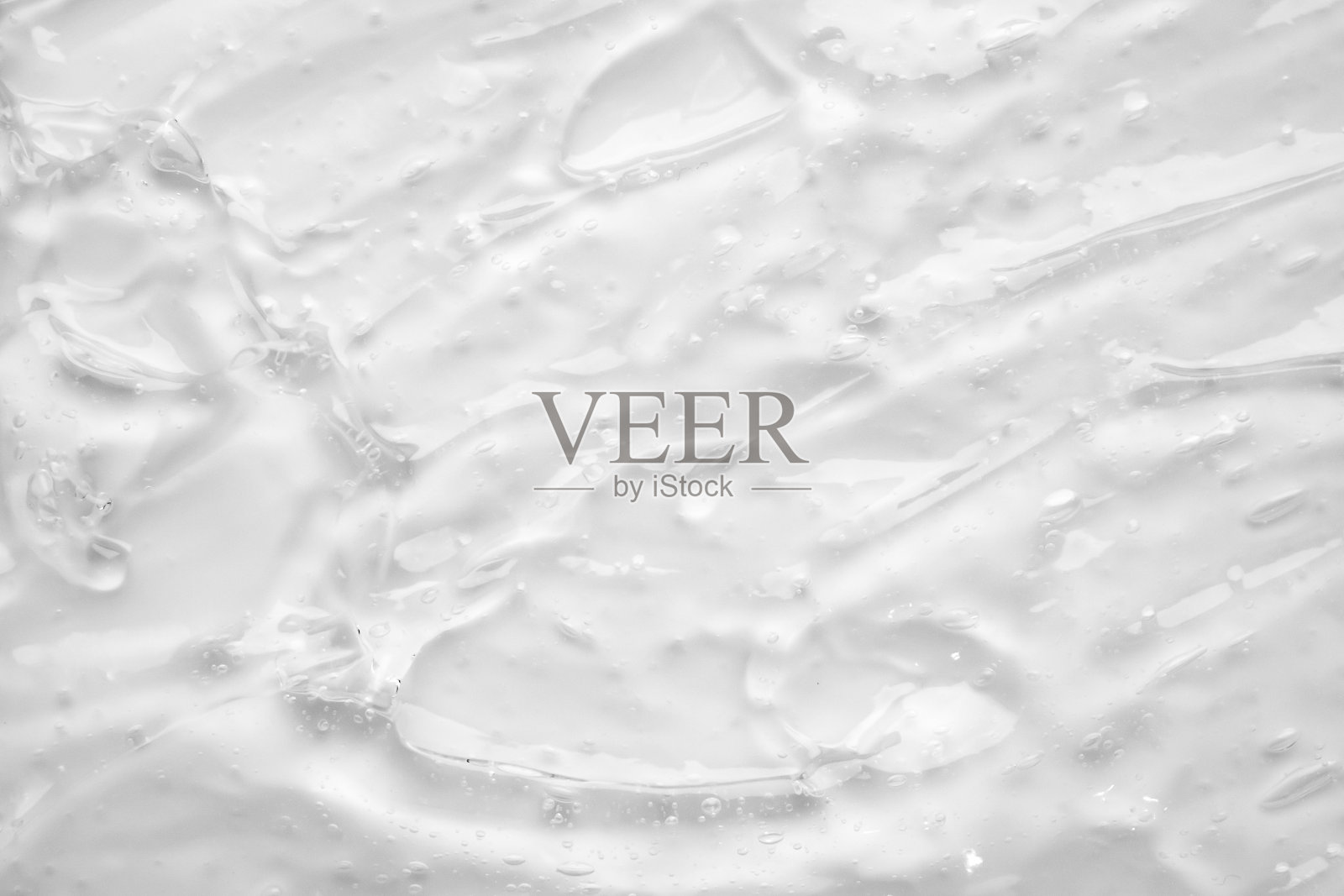 透明透明的液体精华液凝胶化妆品纹理背景照片摄影图片