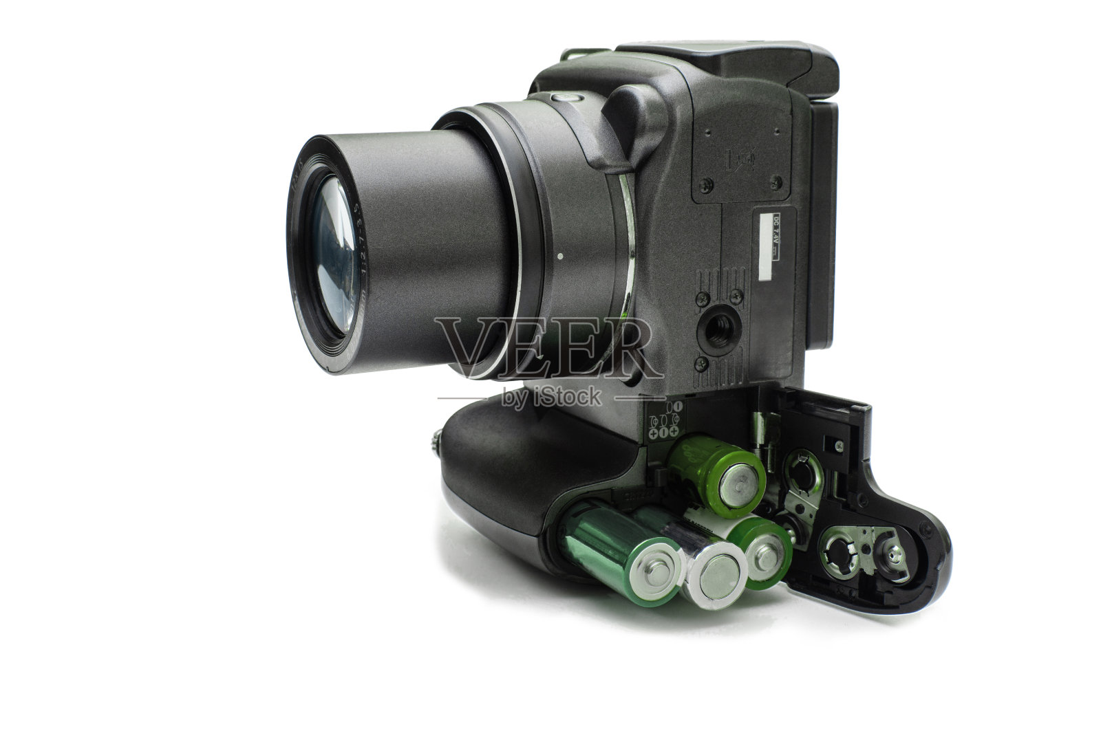 带开放式电池舱的数码相机照片摄影图片