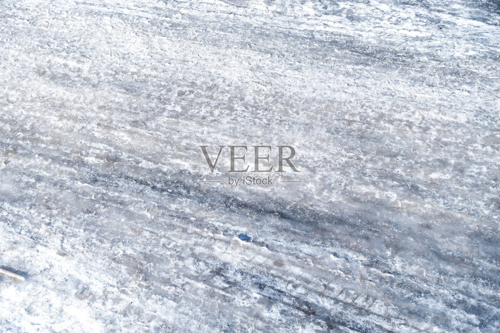 路上有冰和雪——特写照片摄影图片