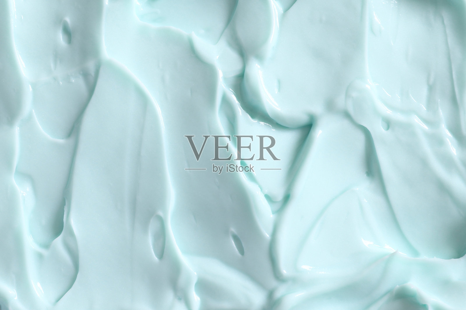 蓝色护肤美容霜的纹理背景在特写照片摄影图片