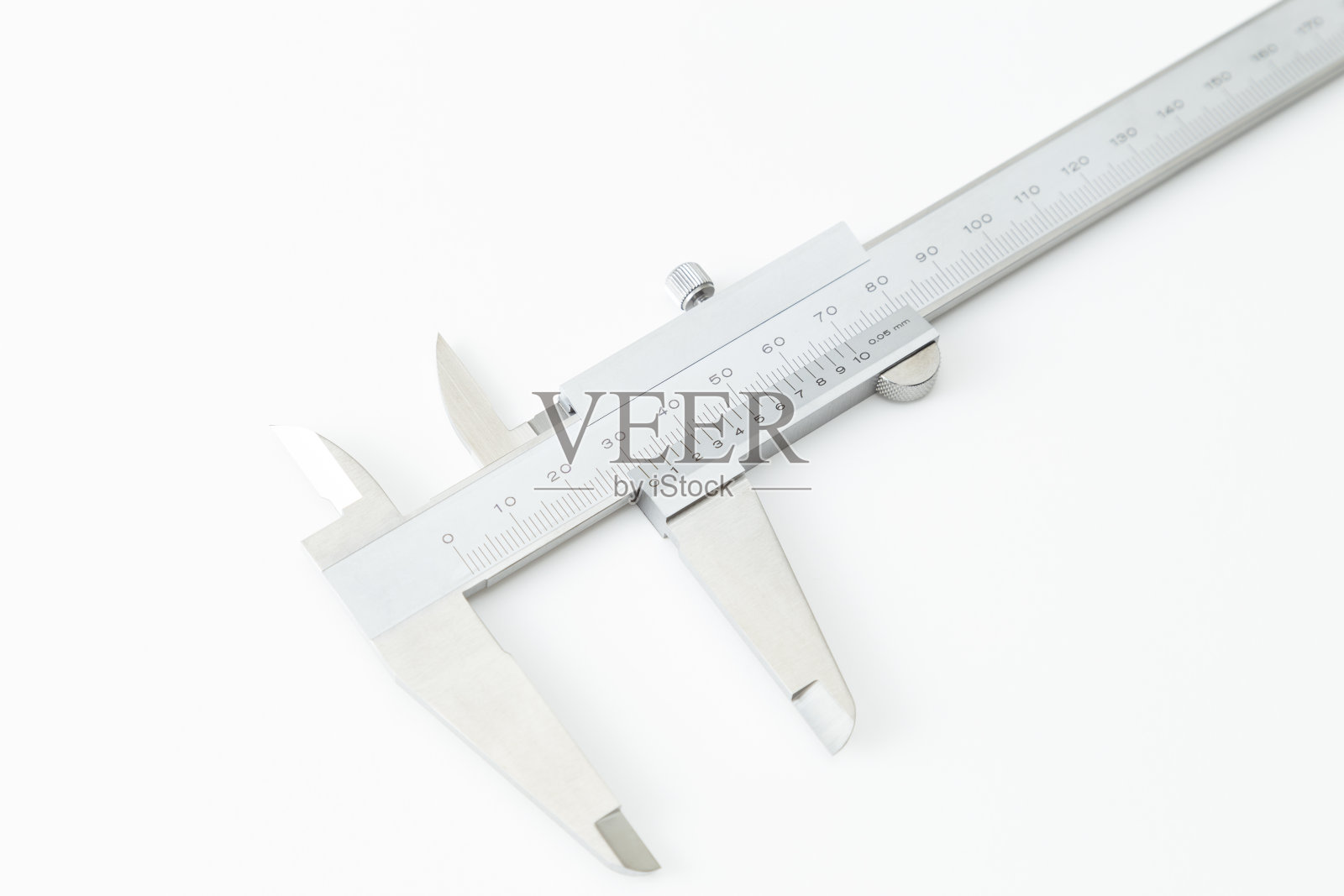 游标卡尺在白色背景上。照片摄影图片