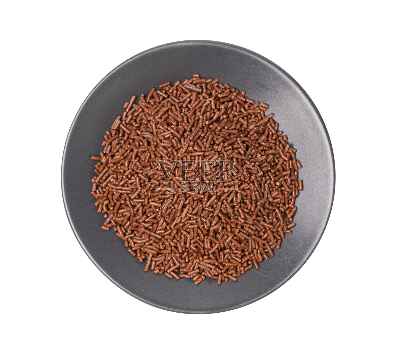 糖果粉堆，甜甜圈巧克力粉，甜棕色釉装饰，巧克力粉丝照片摄影图片