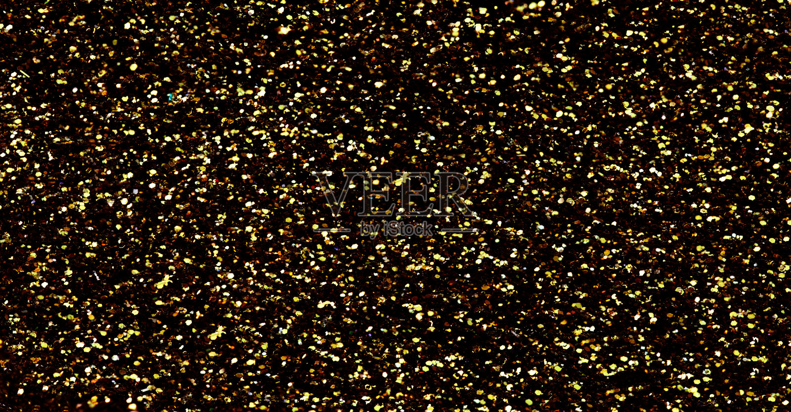 金色闪闪发光的纹理闪闪发光的背景圣诞贺卡。闪烁的金色闪光灯grunge背景照片摄影图片