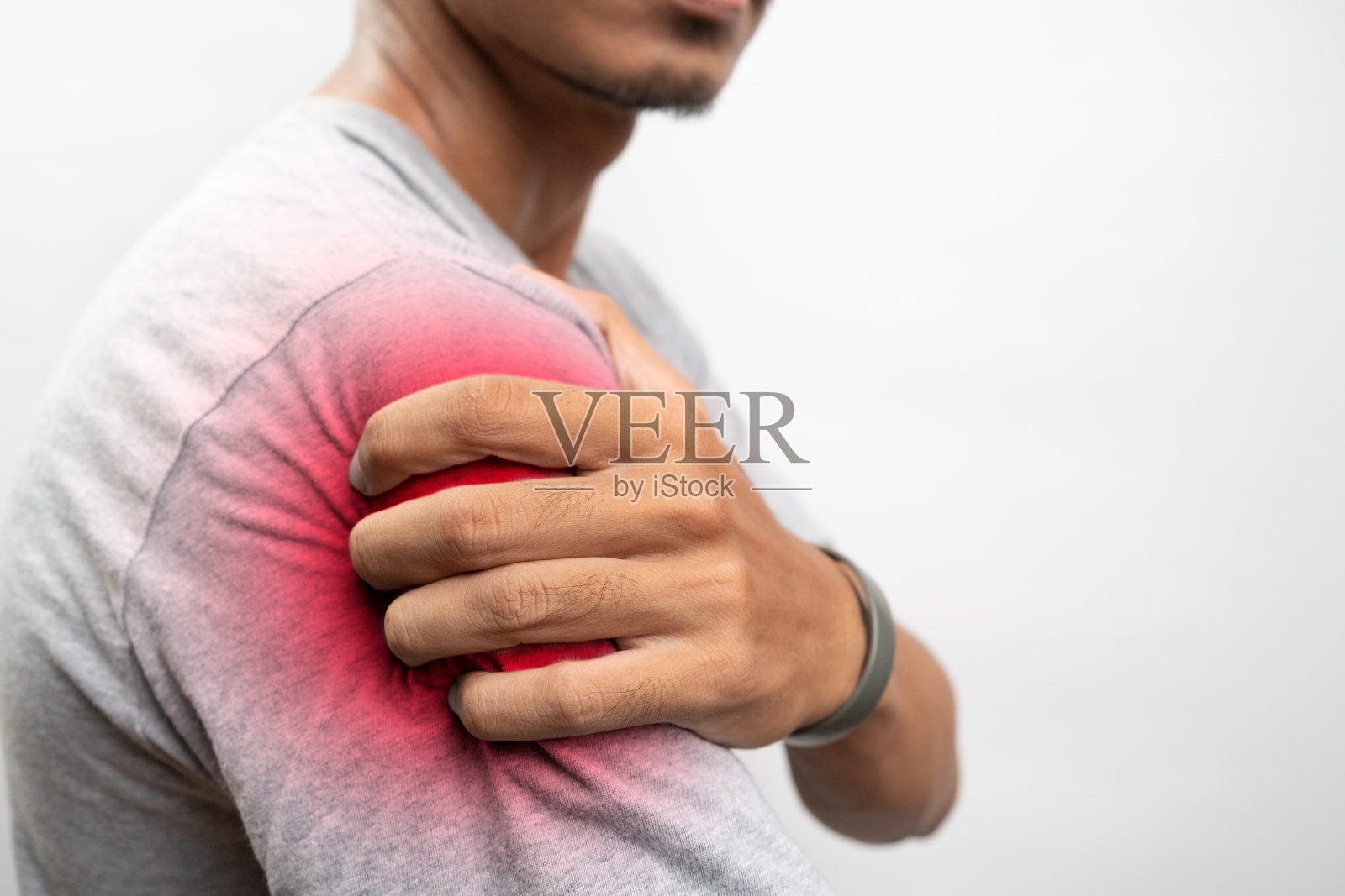 人的肩膀感到疼痛照片摄影图片