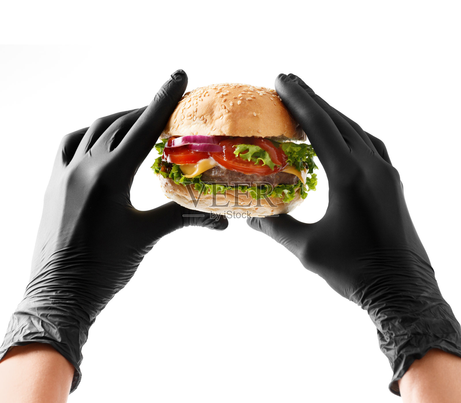 双手戴着黑色手套，拿着白底牛肉汉堡，横幅，汉堡广告，快餐。照片摄影图片