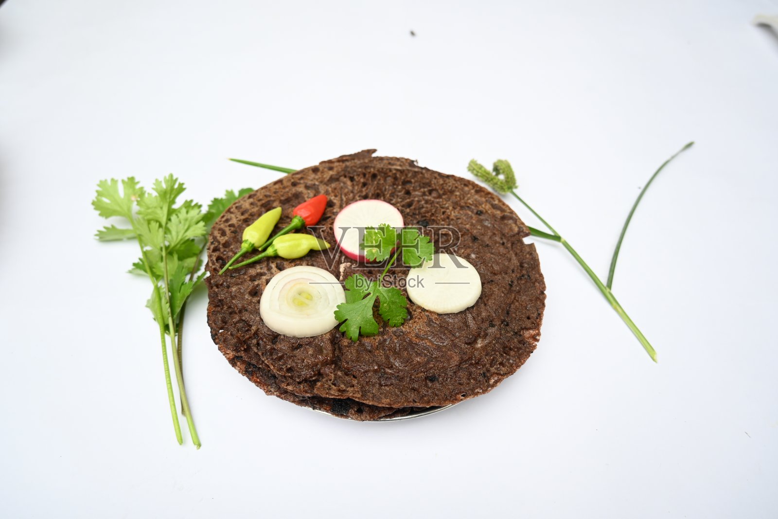 鹰嘴豆或小米薄饼。照片摄影图片