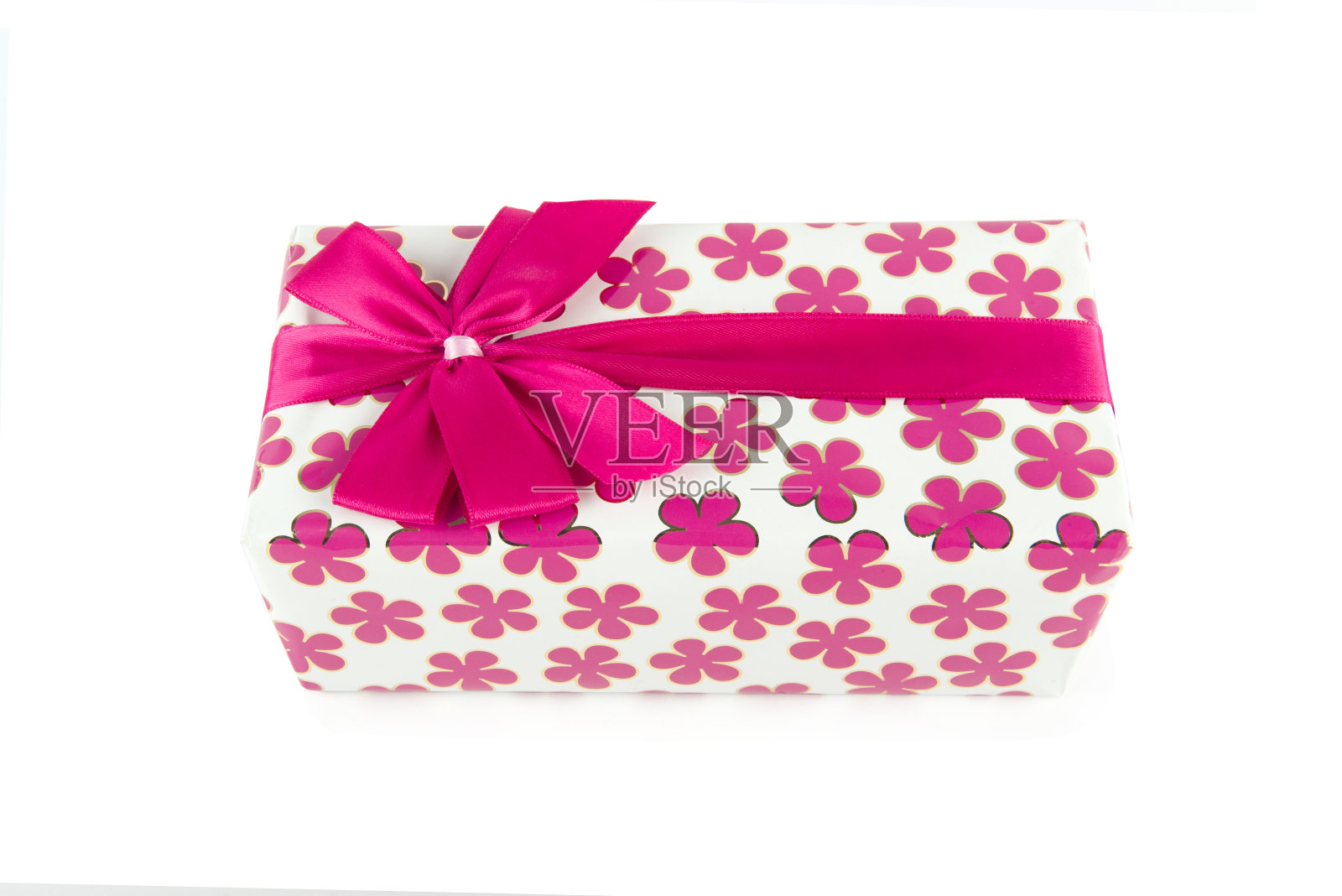 礼物在一个优雅的包装隔离在白色。照片摄影图片