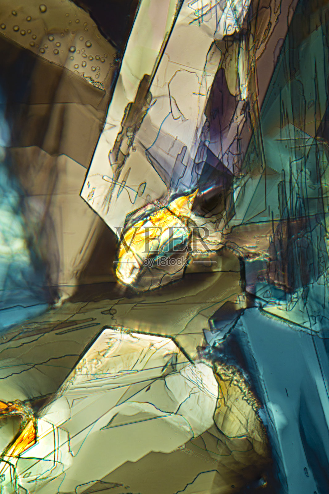 蛋氨酸晶体的抽象显微照片，类似于冰川锋。照片摄影图片