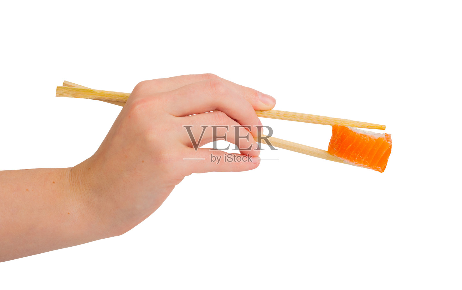 费城卷在筷子上，双手隔离白照片摄影图片