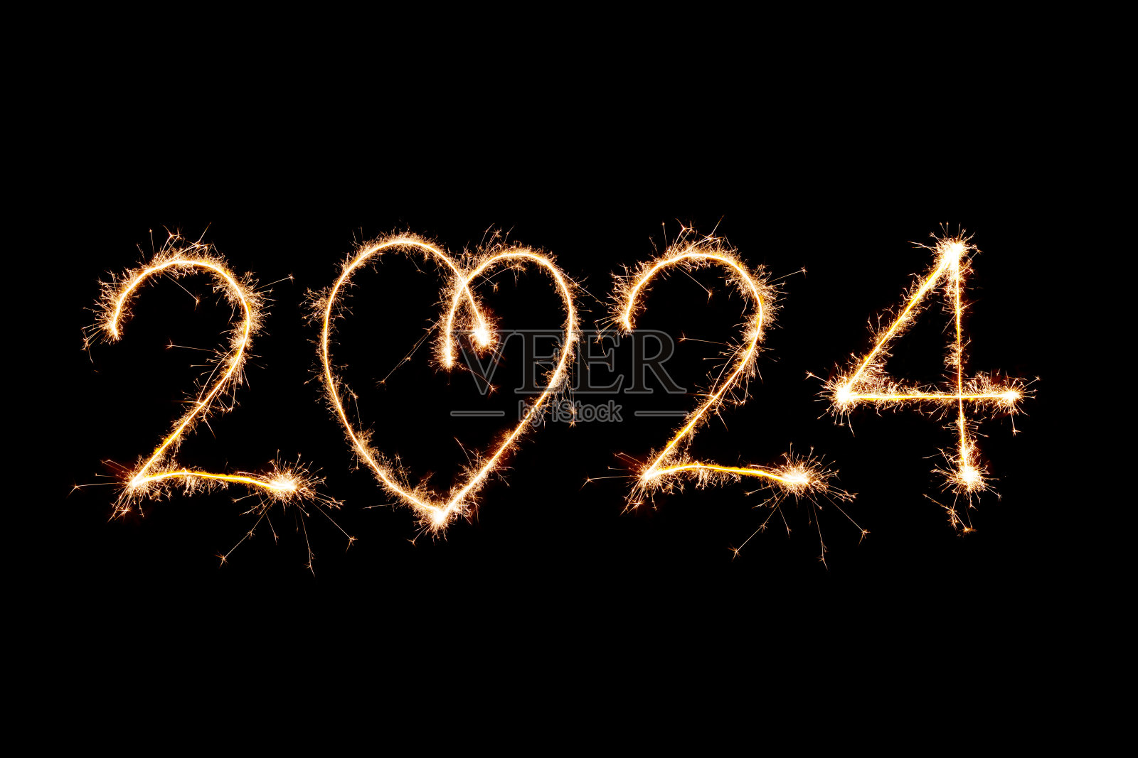 2024写与火花烟花黑色背景，新年快乐的概念照片摄影图片