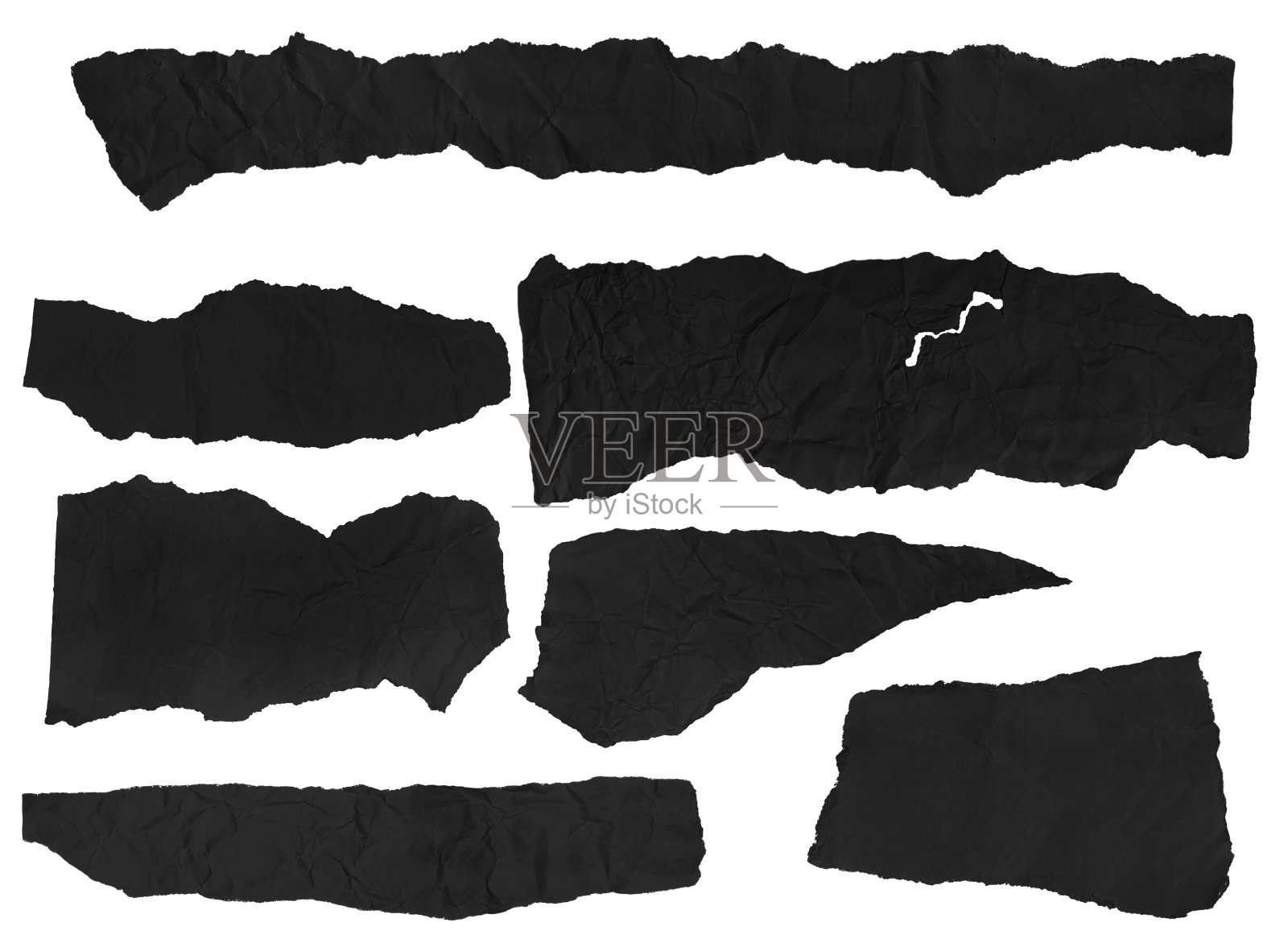 在空白背景上的一组皱巴巴的黑纸。照片摄影图片