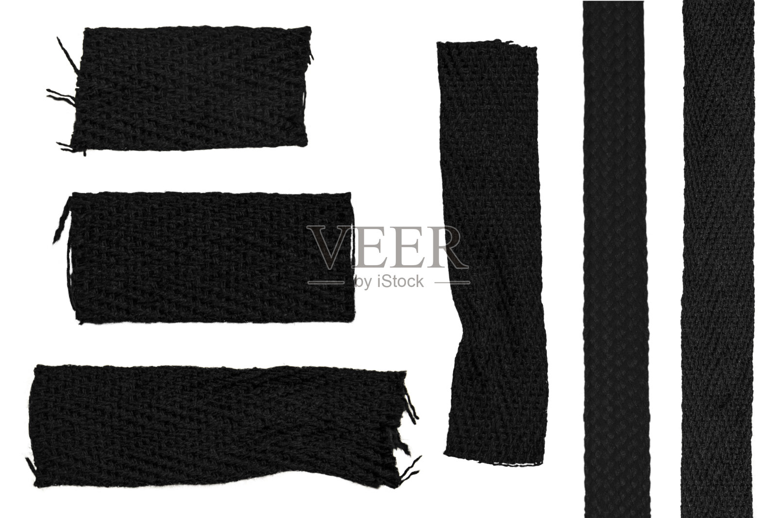 一套在空白背景上有突出线的黑色针织物。照片摄影图片