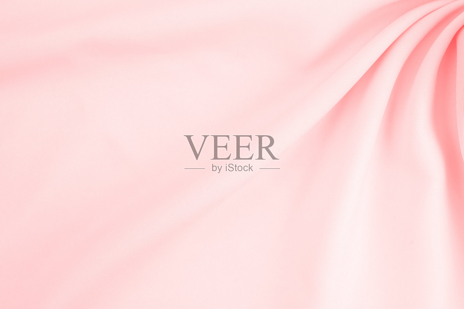 粉红色丝绸背景摘要。照片摄影图片