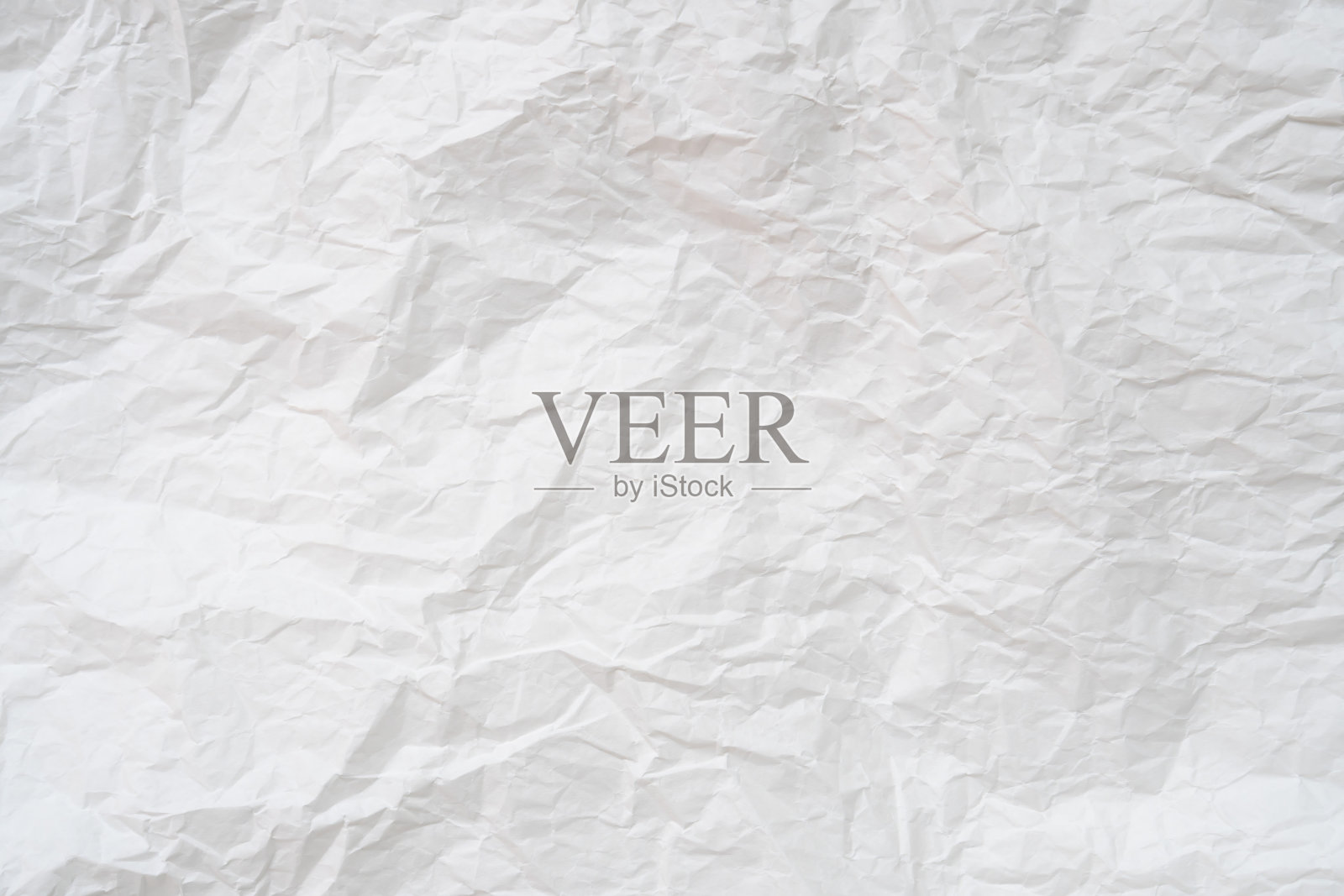 皱巴巴的或皱巴巴的白色模板纸或薄纸，用作皱巴巴的纸的背景纹理照片摄影图片