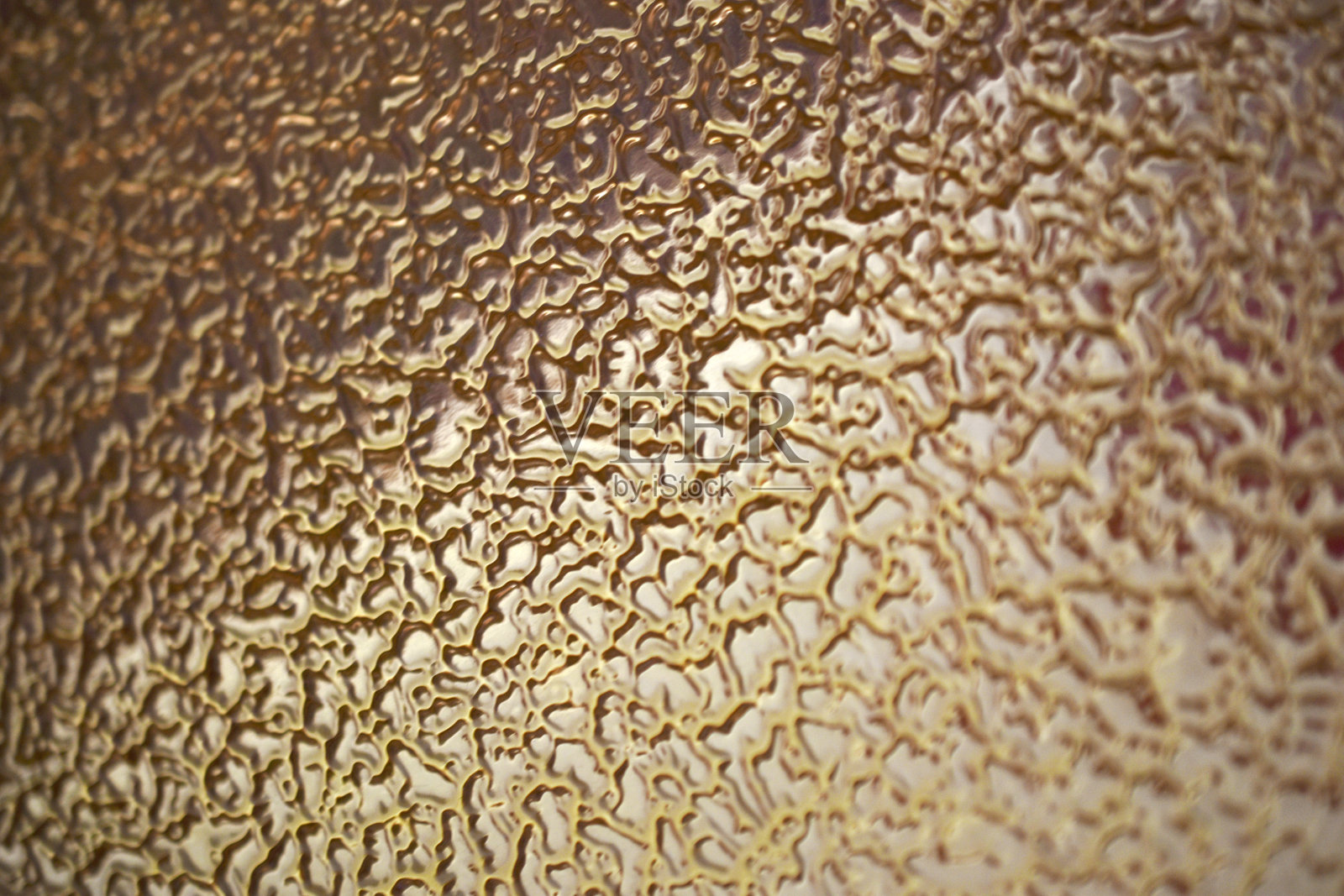 有花纹的绿色玻璃。彩色玻璃图案。照片摄影图片