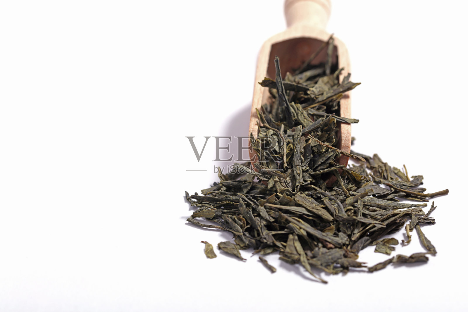 绿茶的干叶和卷叶照片摄影图片