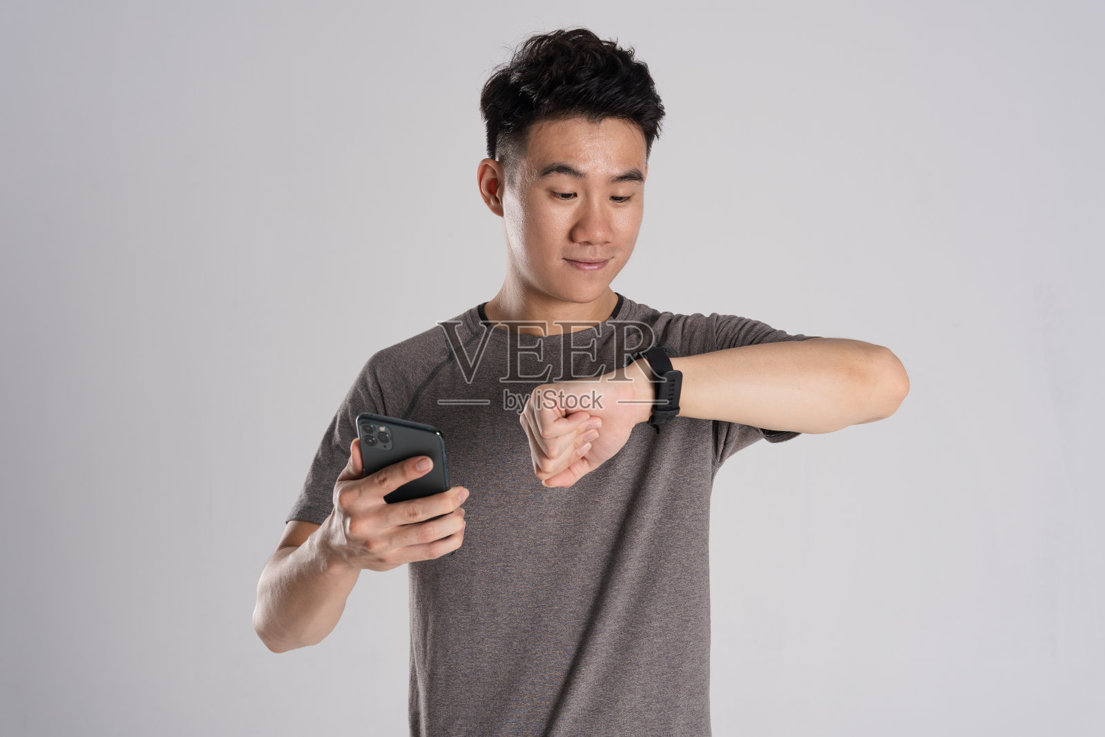 亚洲人在白色背景下锻炼的形象照片摄影图片