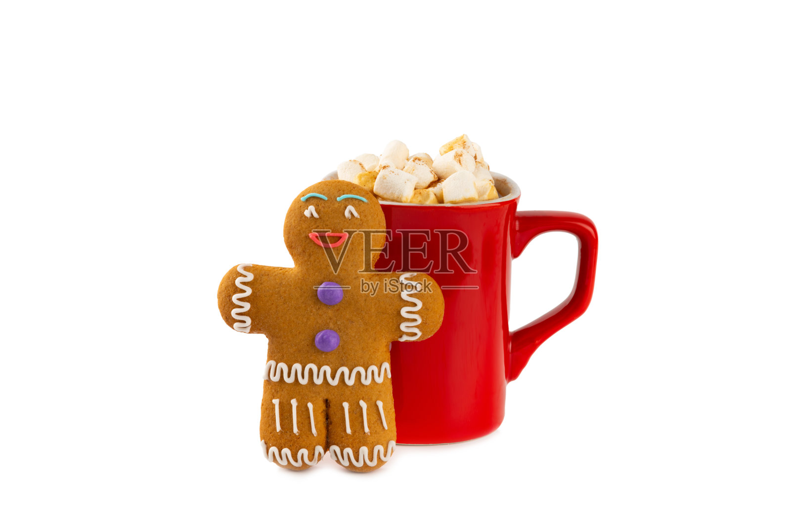 热饮与棉花糖和甘蔗糖在一个蓝色的杯子孤立的白色背景。舒适的季节性假期。热可可配姜饼圣诞饼干。热巧克力加棉花糖和香料。照片摄影图片