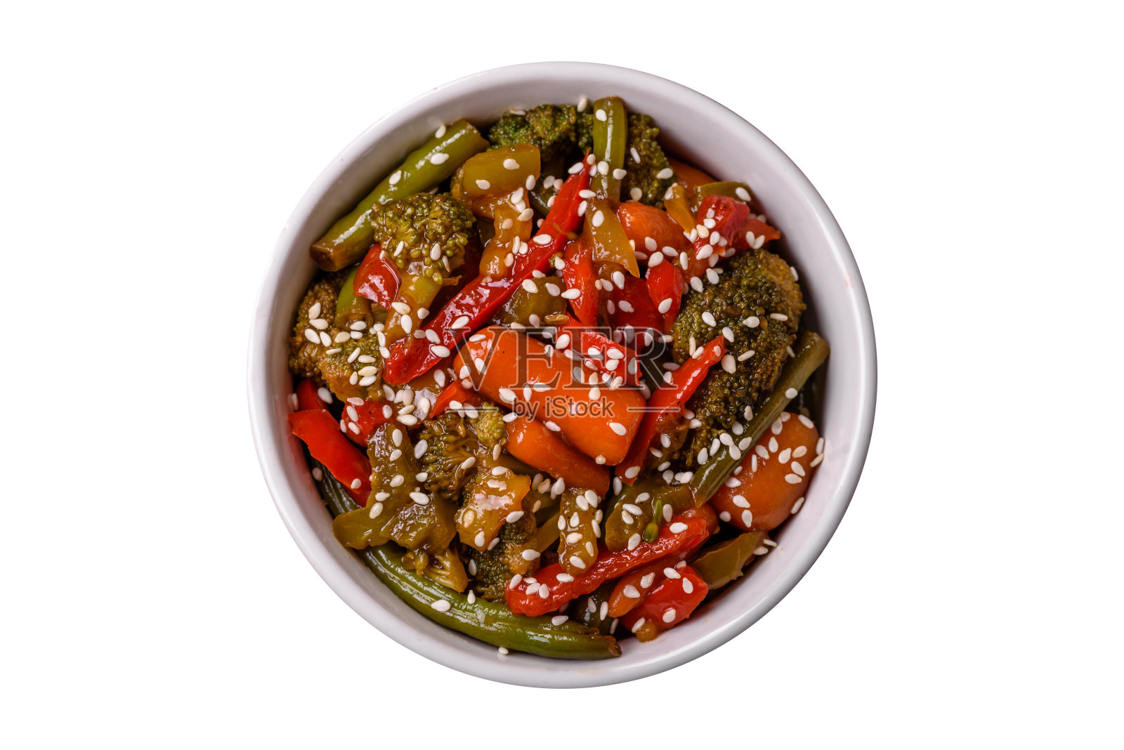 将蔬菜，玉米，胡萝卜，辣椒，西兰花，洋葱混合在照烧酱中照片摄影图片