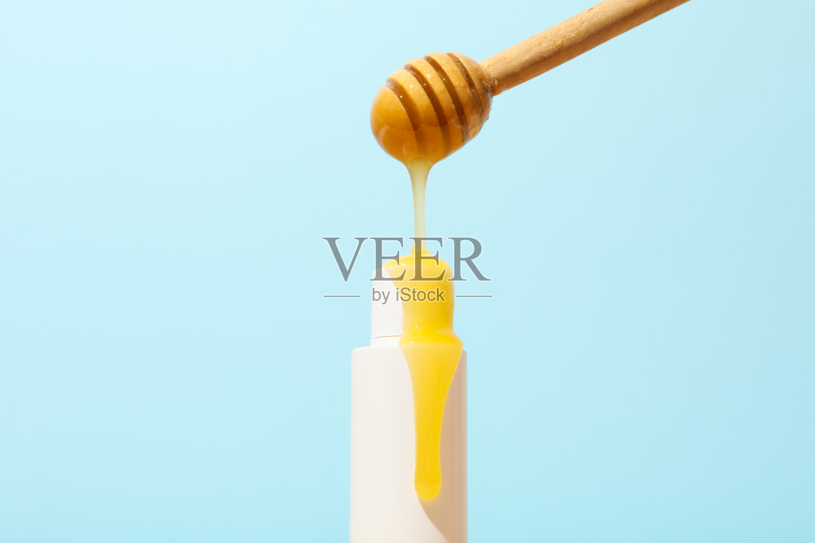 概念面部和皮肤护理用品-蜂蜜化妆品照片摄影图片