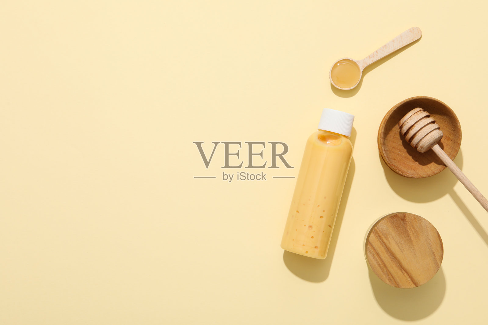 概念面部和皮肤护理用品-蜂蜜化妆品照片摄影图片