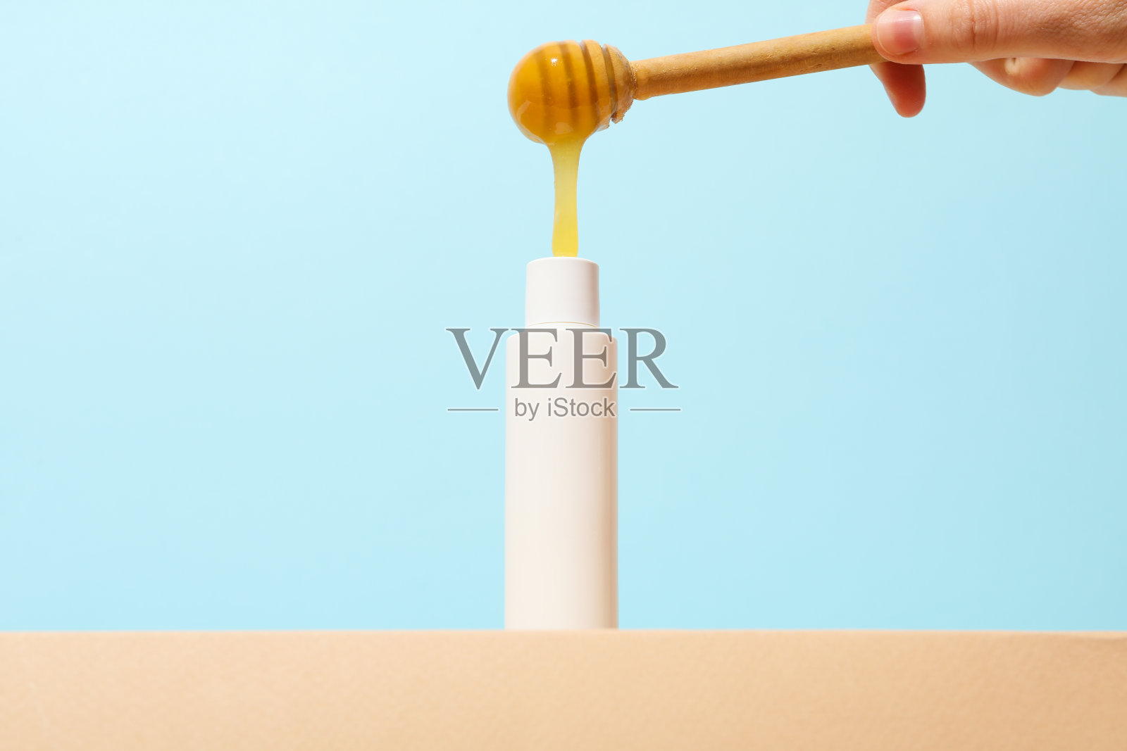 概念面部和皮肤护理用品-蜂蜜化妆品照片摄影图片