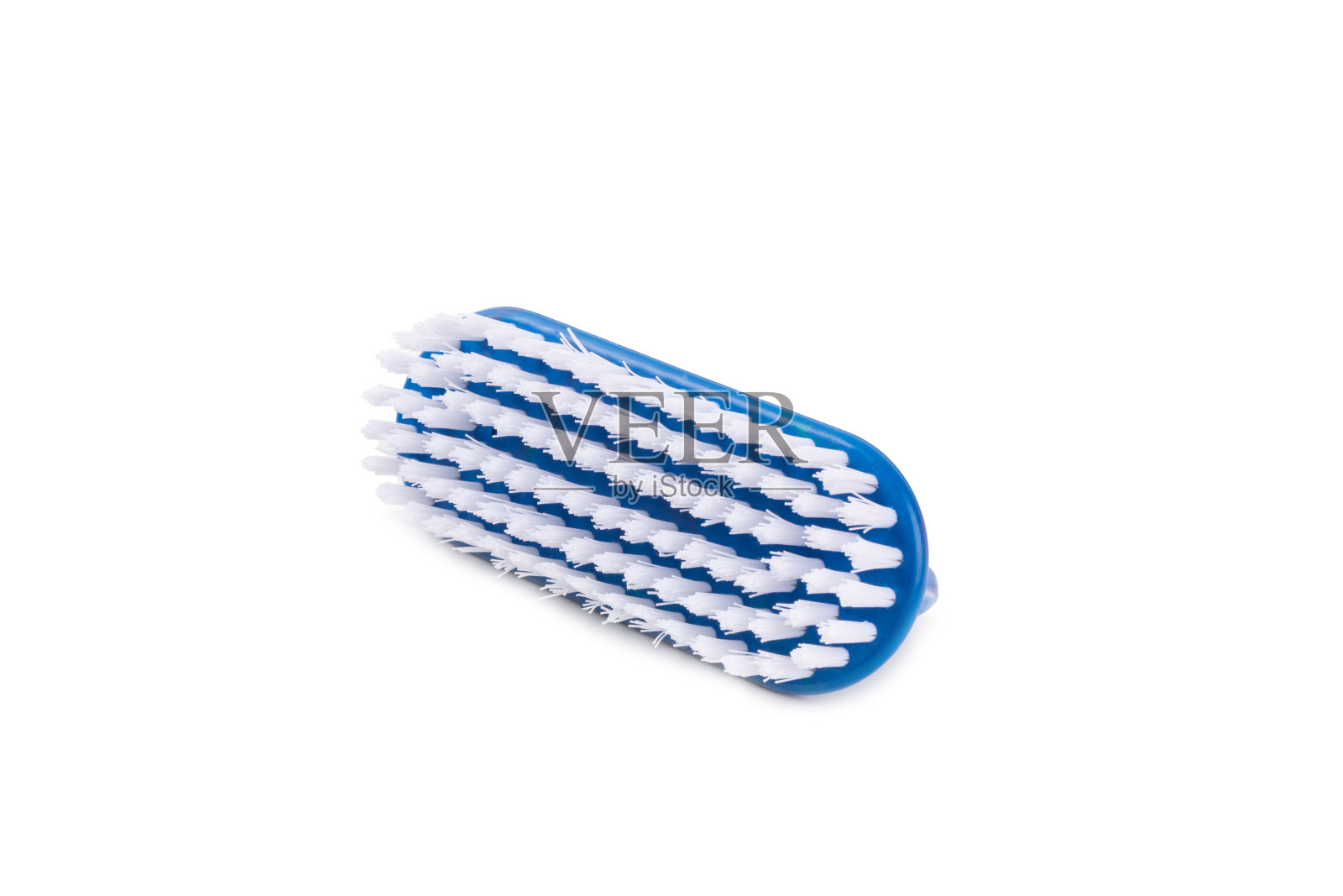 清洁刷隔离在白色背景上。清洁房屋的方便设备。用于清洁衣服、地毯的刷子。家庭护理工具。照片摄影图片