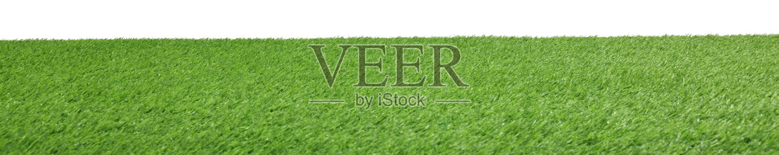 绿色人造草表面孤立在白色上照片摄影图片