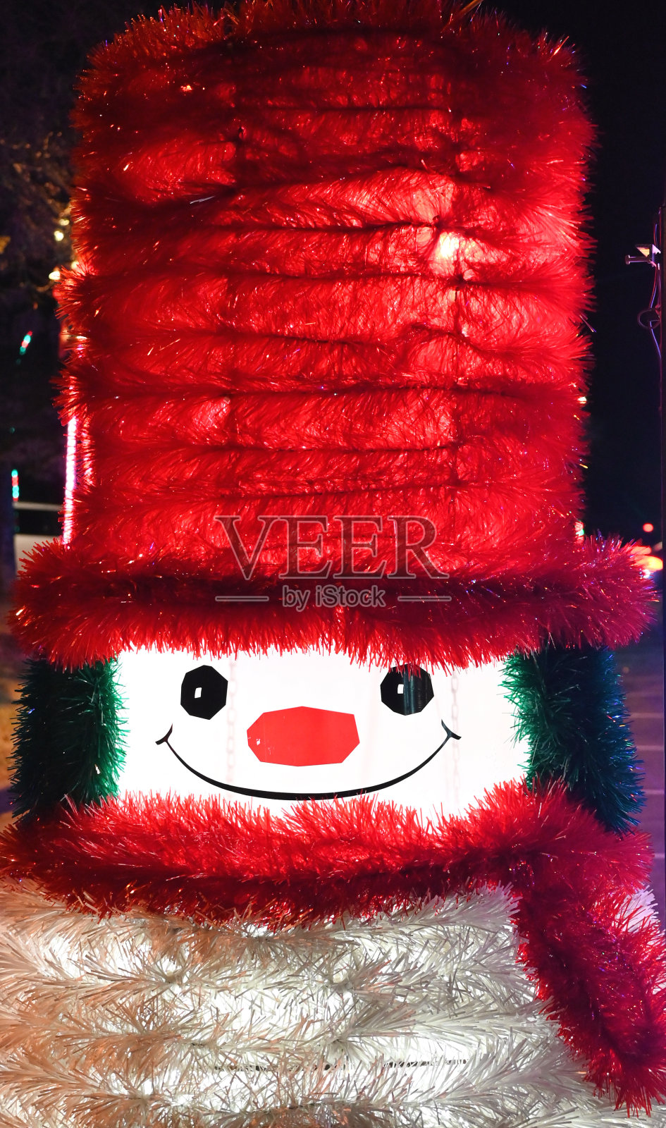 微笑的金丝雪人照片摄影图片