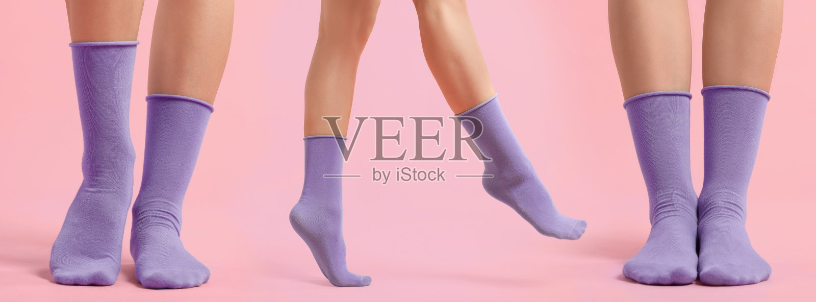 粉色背景上穿紫色袜子的女人，特写。照片收藏照片摄影图片