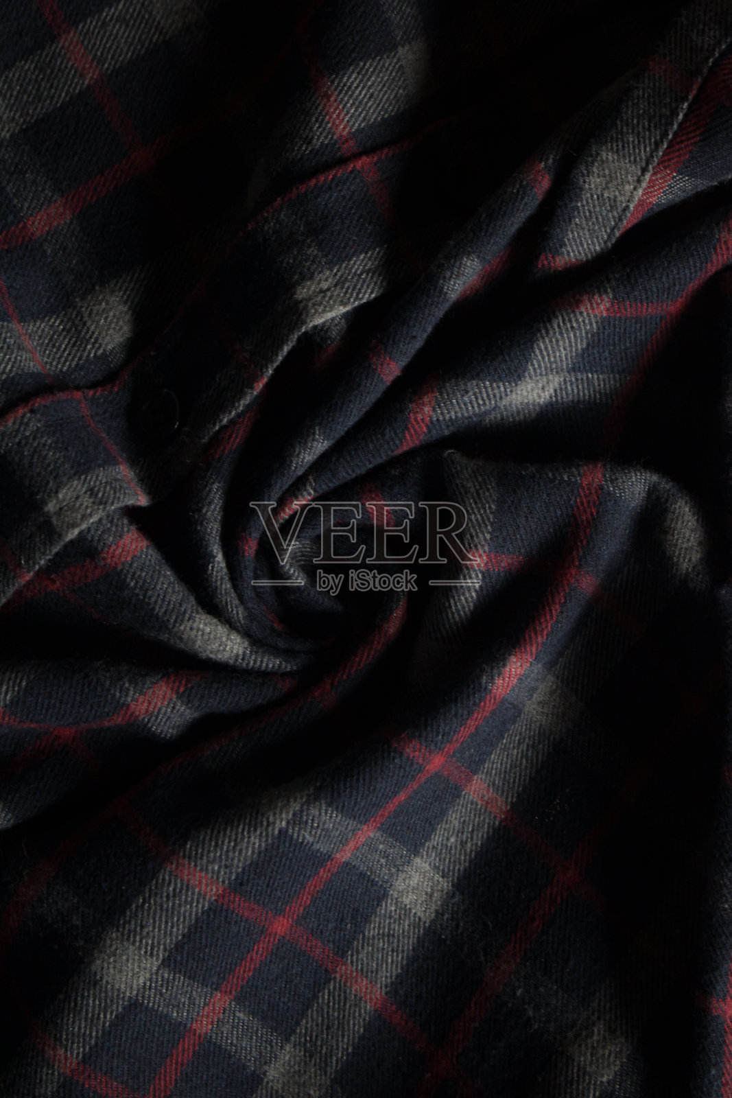 毛织品衬衫的红色和深色的细节照片摄影图片