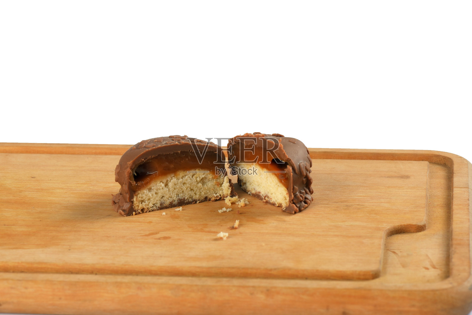 巧克力夹心糖，奶糖可口，焦糖内馅，热量隔离照片摄影图片