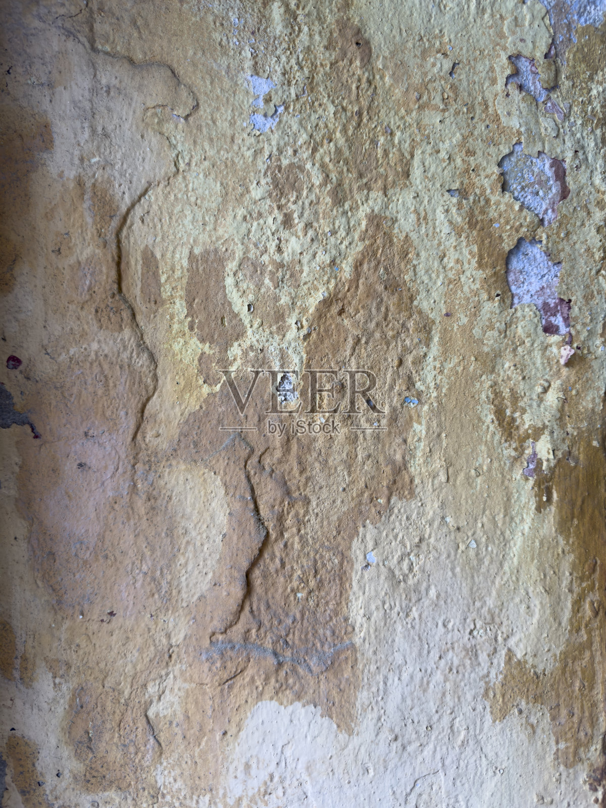 抽象的，细节的，图案的一段多色剥落的油漆层在一个古老的石头外墙。没有人。火鸡。照片摄影图片